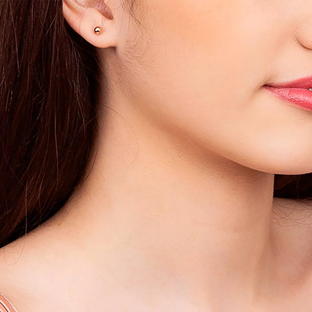BOUCLES D’OREILLES SPHÈRE PLAQUÉ OR 18 CARATS – ÉLÉGANCE INTEMPORELLE